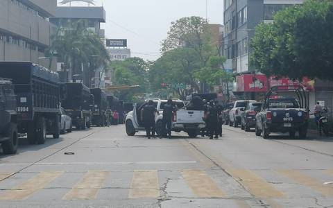 Esta mañana, policías antimotines desalojaron con gas a normalistas quienes causaron destrozos en la zona céntrica de esta ciudad