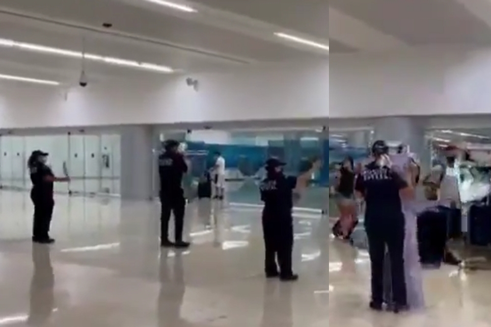 Los elementos policiacos bailaban al ritmo de un R&B del estadounidense Ben E. King en el aeropuerto de Cancún