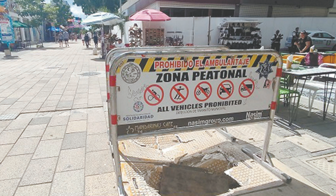 Playa del Carmen: Comerciantes exigen la reparación de un registro roto de la CFE