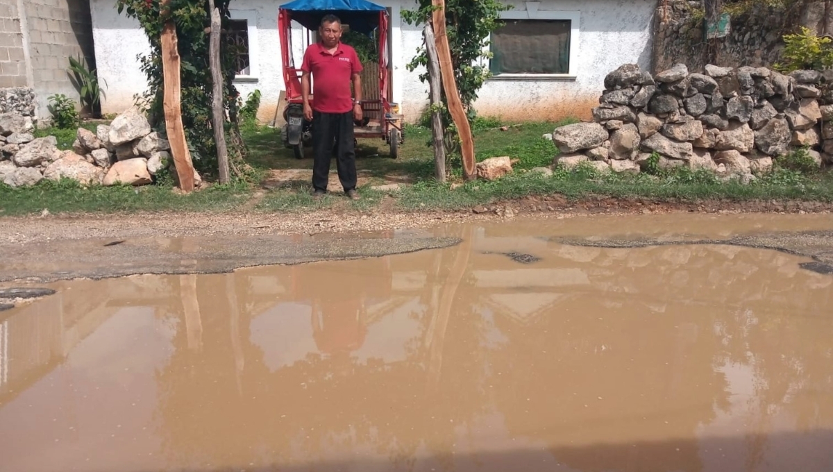Calles de Pomuch, Campeche, se inundan con agua verde y podrida