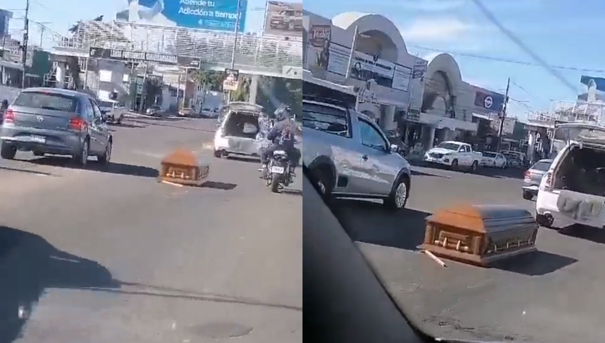 Ataúd cae de una carroza fúnebre en plena calle de Culiacán