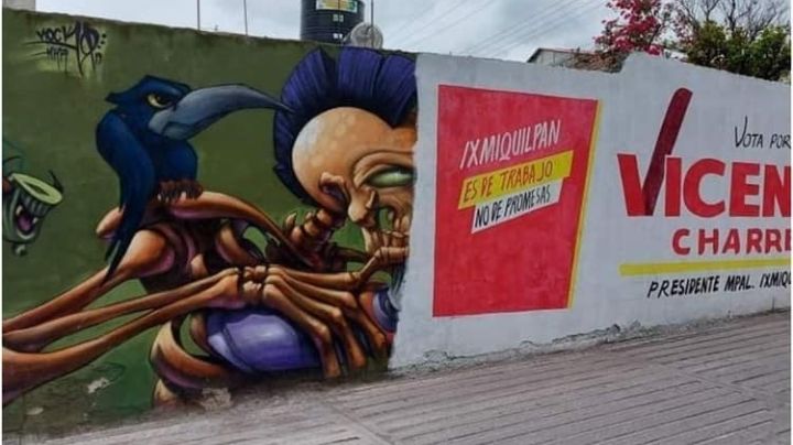 Propaganda política tapa murales urbanos en Tixpéual, Yucatán