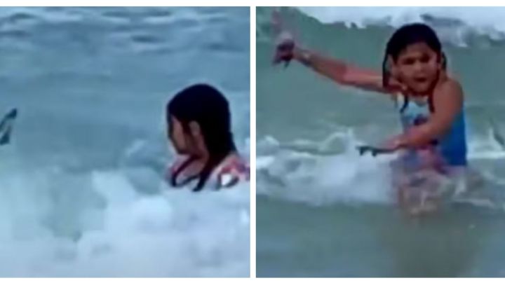 Mujer capta momento en el que su hija de 6 años intenta huir de un tiburón: VIDEO