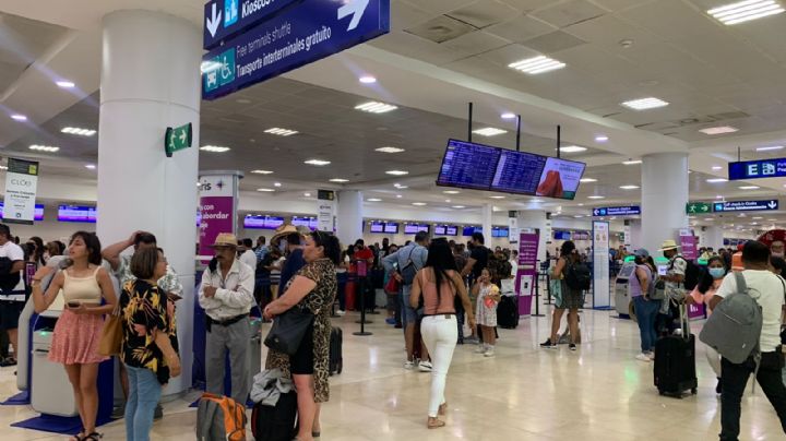 Viajeros, felices por el buen clima a su llegada a Cancún: EN VIVO
