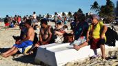 Progreso: Ni la Feria Xmatkuil ni la "heladez" detiene a bañistas