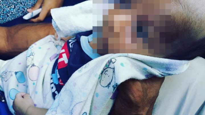 Rescatan a bebé que era regalado en la vía pública en Cancún