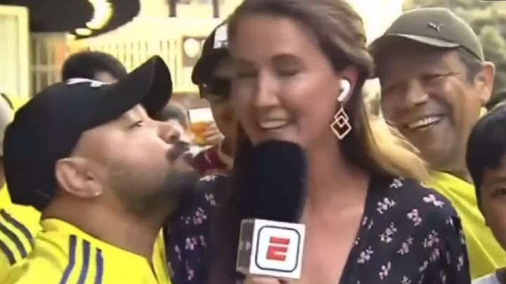 Periodista empuja a aficionado que intentó besarla en vivo; lo buscan por acoso: VIDEO